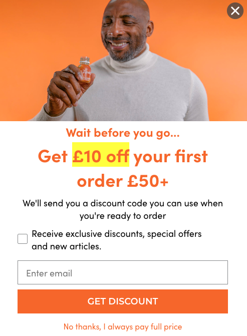 The Turmeric Co brand-colored exit-intent popup signup example