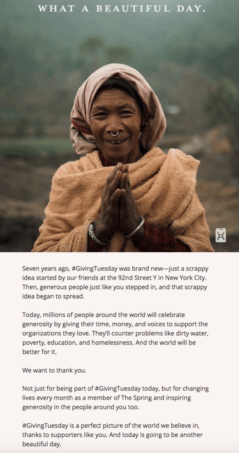 Charity: Water Giving Tuesday email featuring a smiling woman in traditional clothing with the headline ‘What a beautiful day,’ thanking supporters for their generosity.