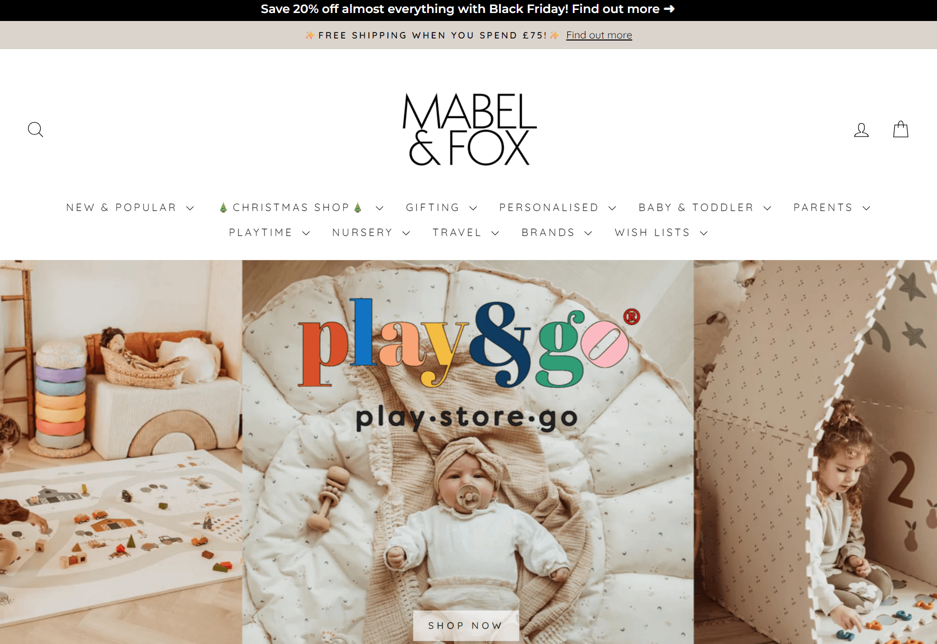 shopify general store: Screenshot of the Mabel & Fox website homepage featuring a banner for play&go with a baby lying on a soft play mat, surrounded by toys and nursery decor. Navigation menus and promo offers appear above.