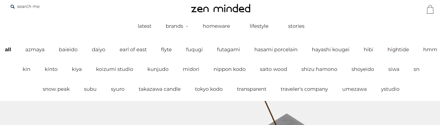 Screenshot of the zen minded website header, showing navigation links for categories like latest, brands, homeware, lifestyle, and stories, plus a list of brand names beneath the main menu.