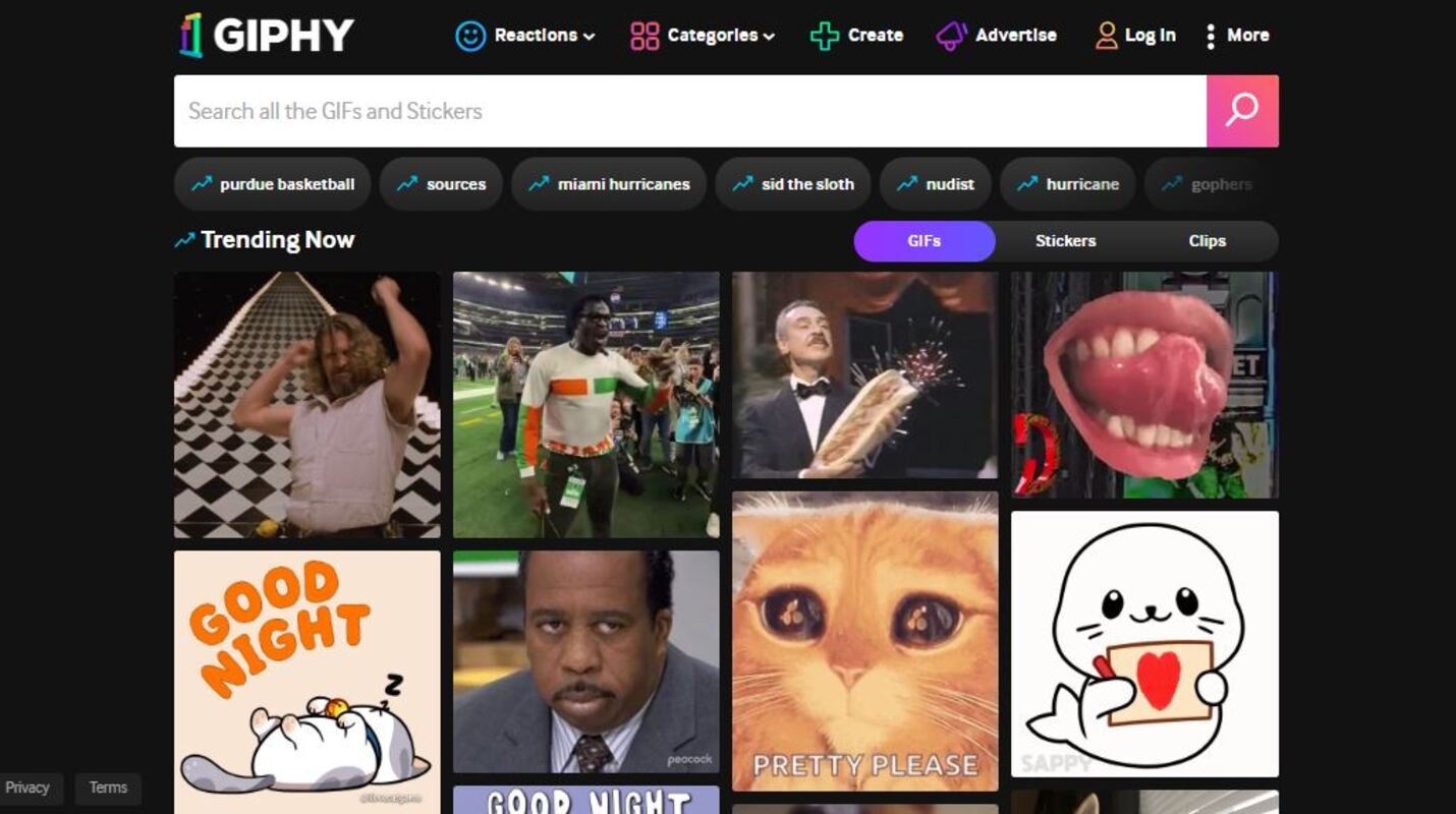 How to add GIF to text: Screenshot of the GIPHY website homepage showing a search bar, navigation options, and a selection of trending GIFs, including a cat, a dancing man, a waving cartoon seal, and a man holding a cake.