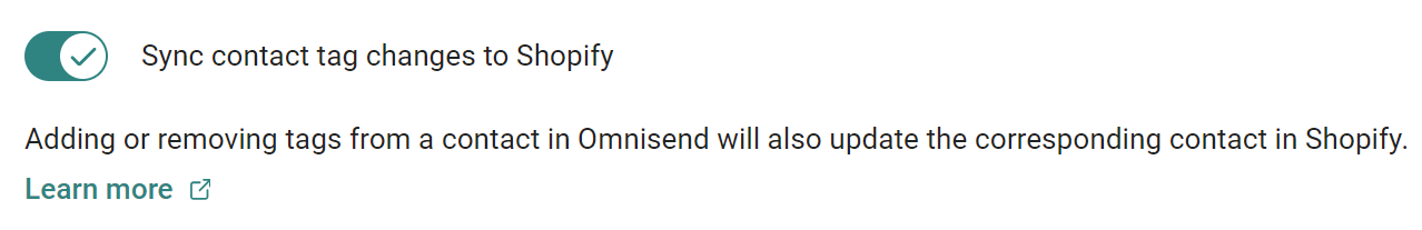 Shopify store maintenance: A toggle switch labeled Sync contact tag changes to Shopify is switched on. Below, text explains that adding or removing tags in Omnisend will also update the corresponding contact in Shopify, with a Learn more link.
