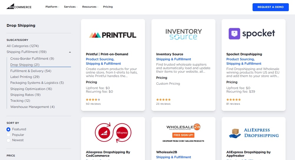 BigCommerce dropshipping: A webpage displaying a list of drop shipping services with company cards for Printful, Inventory Source, Spocket, AliExpress Dropshipping, and Wholesale2B. Each card shows the company name, summary, and pricing details. A sidebar lists categories.