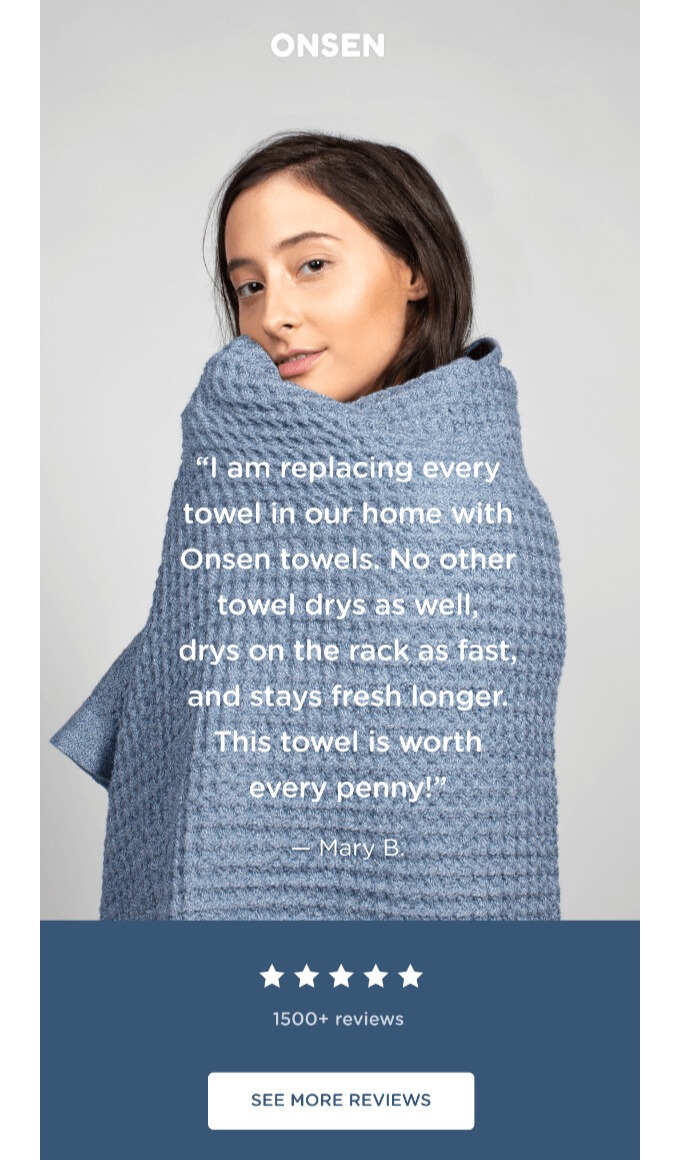 Email design best practices: A woman wrapped in a blue textured towel looks over her shoulder. Overlaid text shares a positive review about Onsen towels, highlighting their quick-drying and freshness. Below are five stars, review count, and a button to see more reviews.