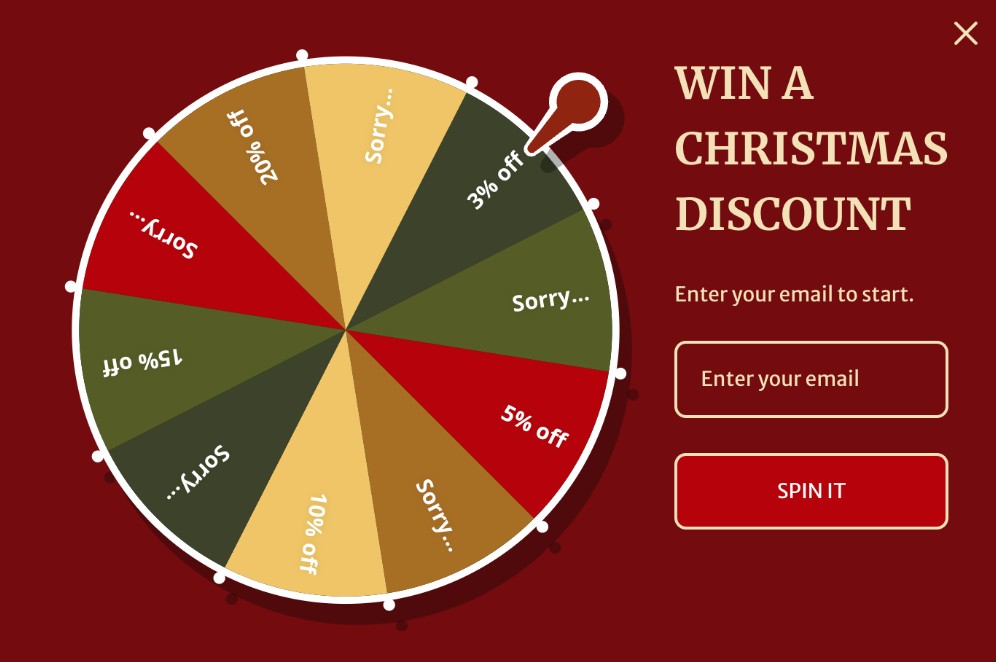 WordPress popup plugins: A spinning prize wheel with sections labeled “Sorry,” “3% off,” “5% off,” “10% off,” “15% off,” and “20% off” next to text reading “Win a Christmas Discount” and email entry fields.