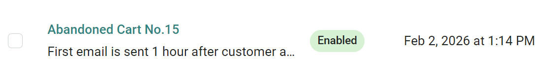 Abandoned cart email: A row showing Abandoned Cart No. 15, status as Enabled in green, and the date and time Feb 2, 2026 at 1:14 PM. The email sends 1 hour after a customer action. A checkbox is on the left.