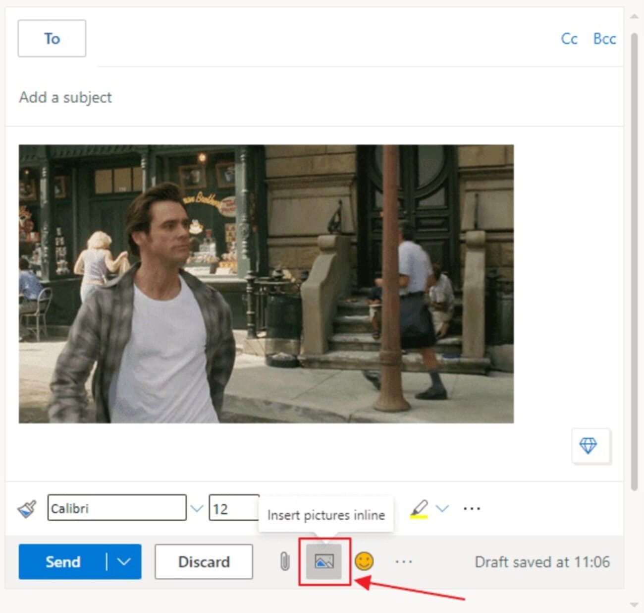 How to insert a GIF into an email: Screenshot of an email draft with a GIF of a man in a white shirt and jacket walking briskly on a city street. The Insert pictures inline button is highlighted with a red arrow.