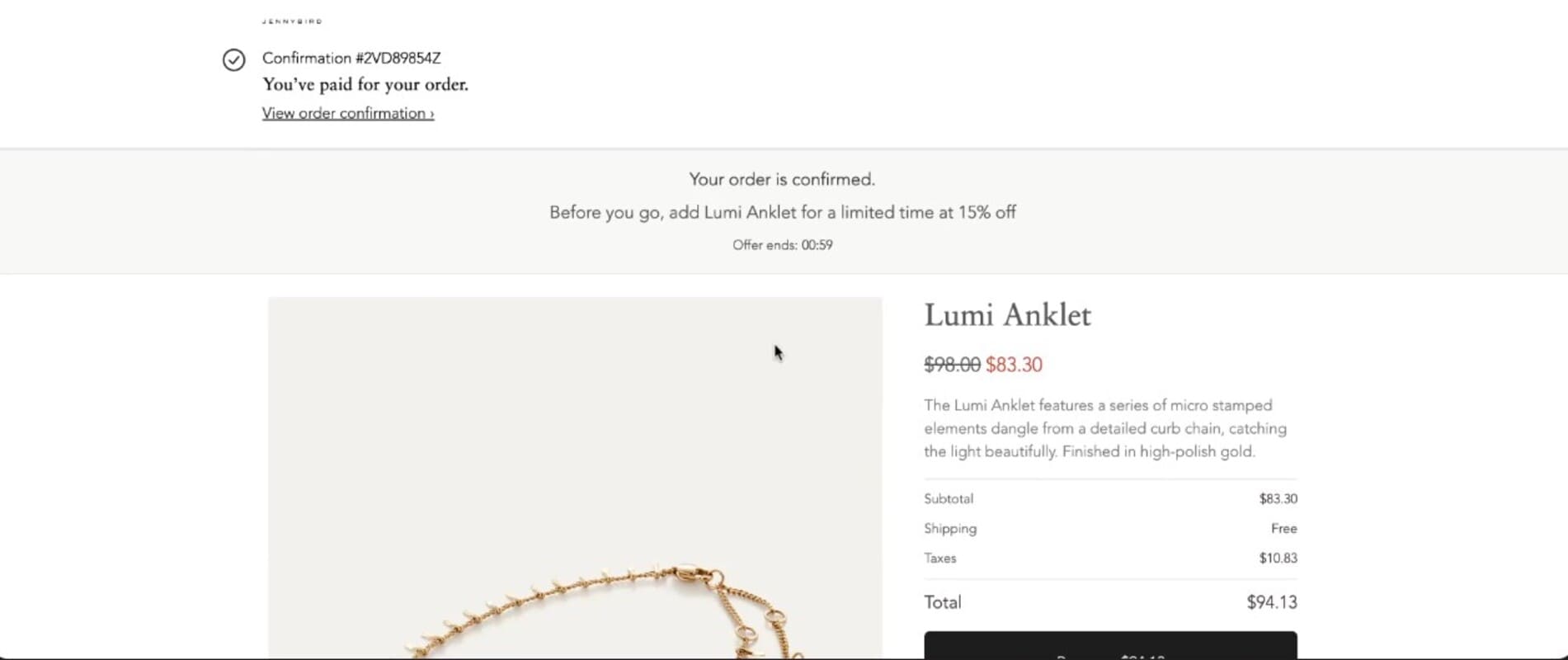 Shopify checkout: Screenshot of an online order confirmation page showing a discounted offer for a Lumi Anklet, originally $98, now $83.30. Order total is $94.13. The top of the page confirms payment and provides order details.