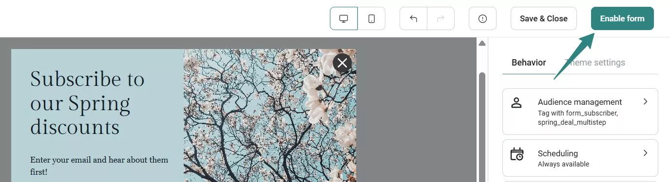 Shopify discount popup: Screenshot of an email form builder showing a Spring discounts subscription form on the left and a highlighted Enable form button in the top right corner. 