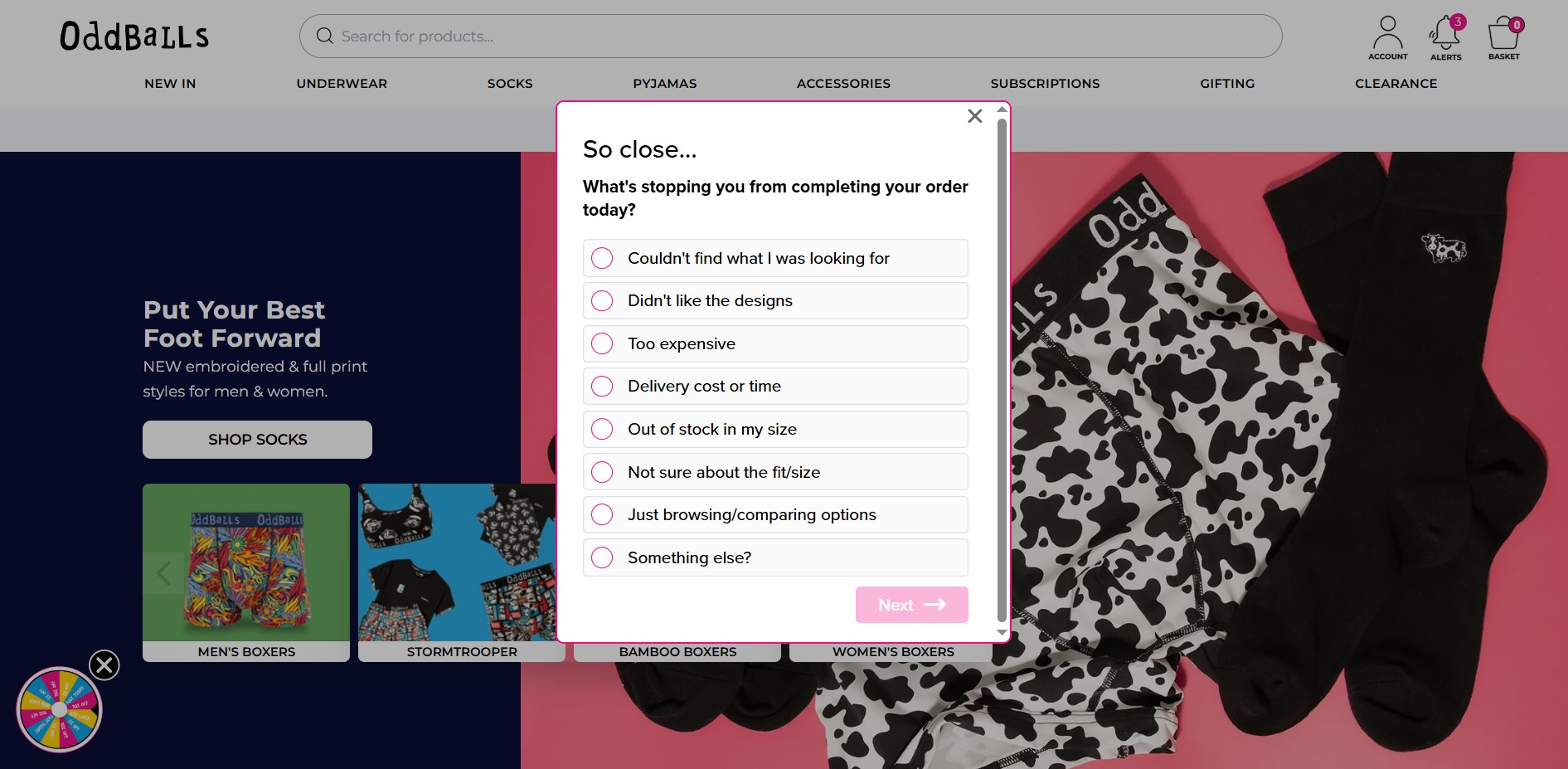 Popup timing: A pop-up survey on the OddBalls website asks why a user didnt complete their order, listing reasons such as price, design, delivery, size, stock, browsing, and other options. Socks are displayed in the background.