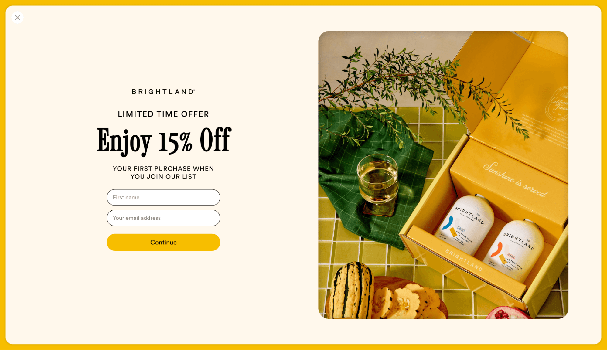 Mother's day popups: A promotional offer for Brightland with “Enjoy 15% Off” text, a signup form on the left, and an open yellow box with two jars, a drink, olive branches, and snacks on a green tiled surface on the right.