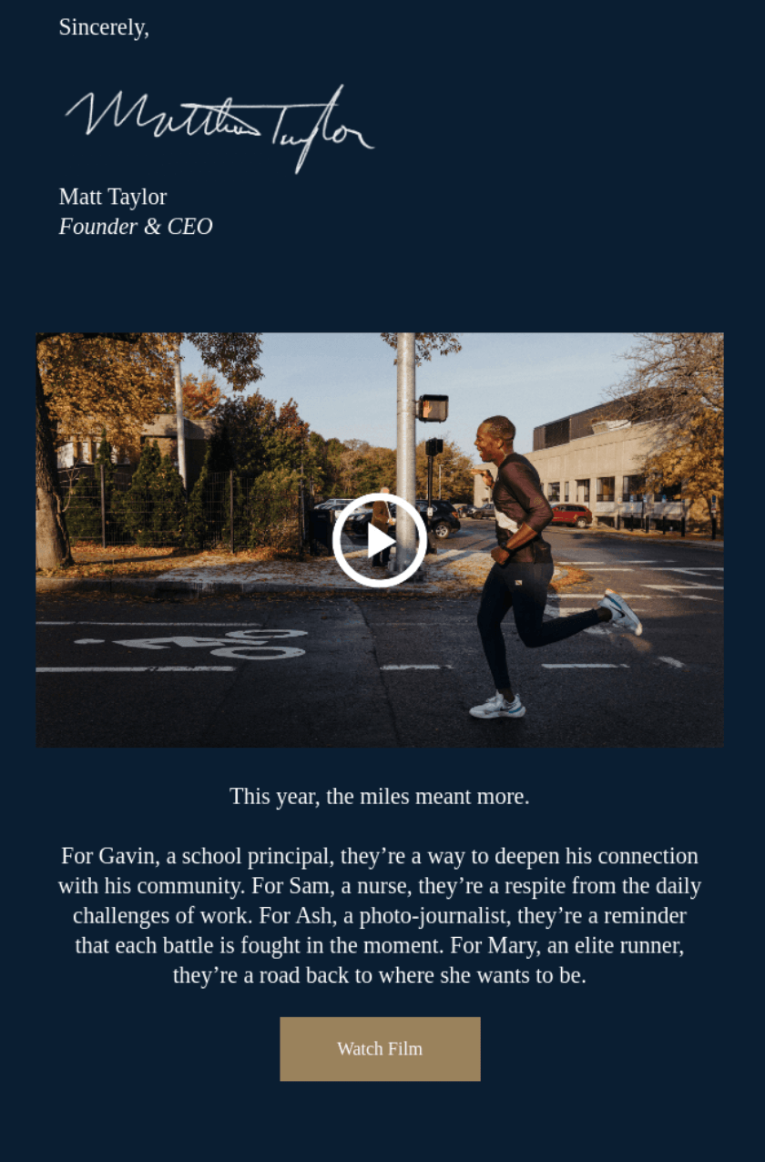 Video email marketing: A man in athletic wear runs on a city sidewalk past a school, while a yellow school bus is parked nearby. The image includes a play button overlay, suggesting a video. Text appears above and below the image.