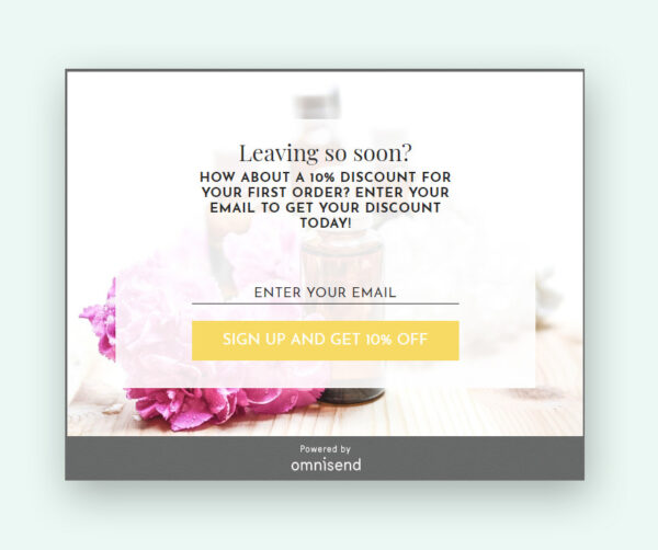 Email capture: A pop-up message offers a 10% discount for first orders in exchange for an email address. The background features pink flowers and a bottle. A yellow button reads Sign up and get 10% off.