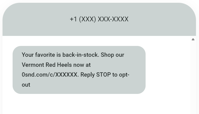 Clothing brand marketing ideas: A text message reads: Your favorite is back-in-stock. Shop our Vermont Red Heels now at 0snd.com/c/XXXXXX. Reply STOP to opt-out from a phone number with digits hidden.