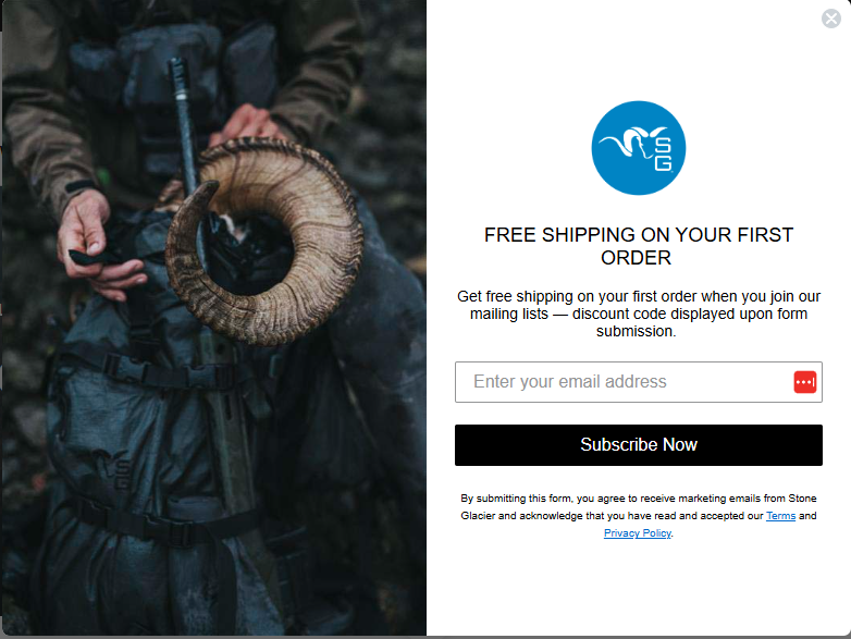 SMS opt-in message examples: A person in outdoor clothing holds a large ram’s horn next to a backpack. Beside them is a sign-up form offering free shipping on a first order for joining Stone Glacier’s mailing list, with a blue logo and subscribe button.