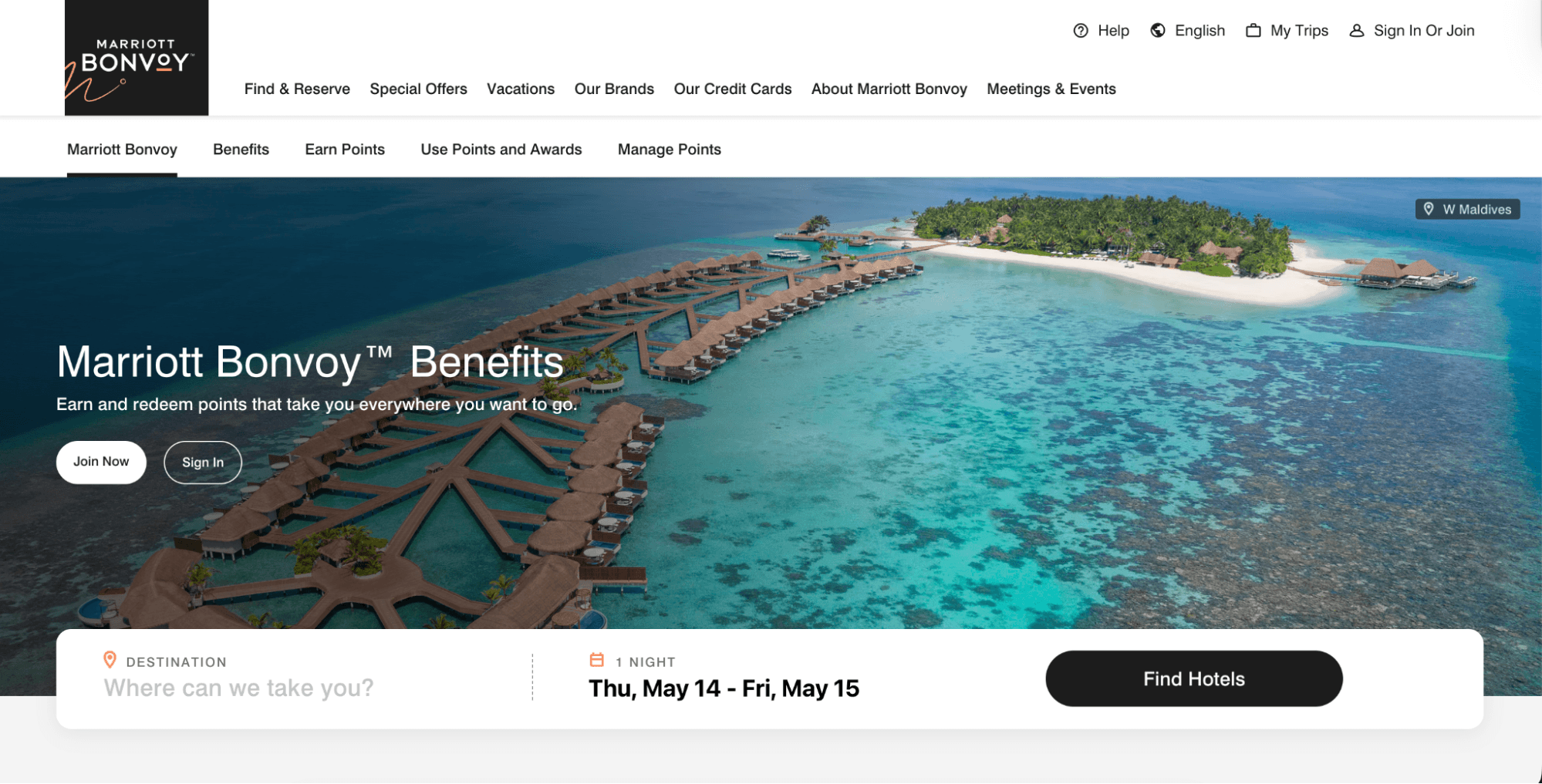 Loyalty programs: A website homepage for Marriott Bonvoy featuring overwater bungalows in a blue lagoon, a small lush island, and options for finding hotels, signing in, and exploring rewards and benefits.