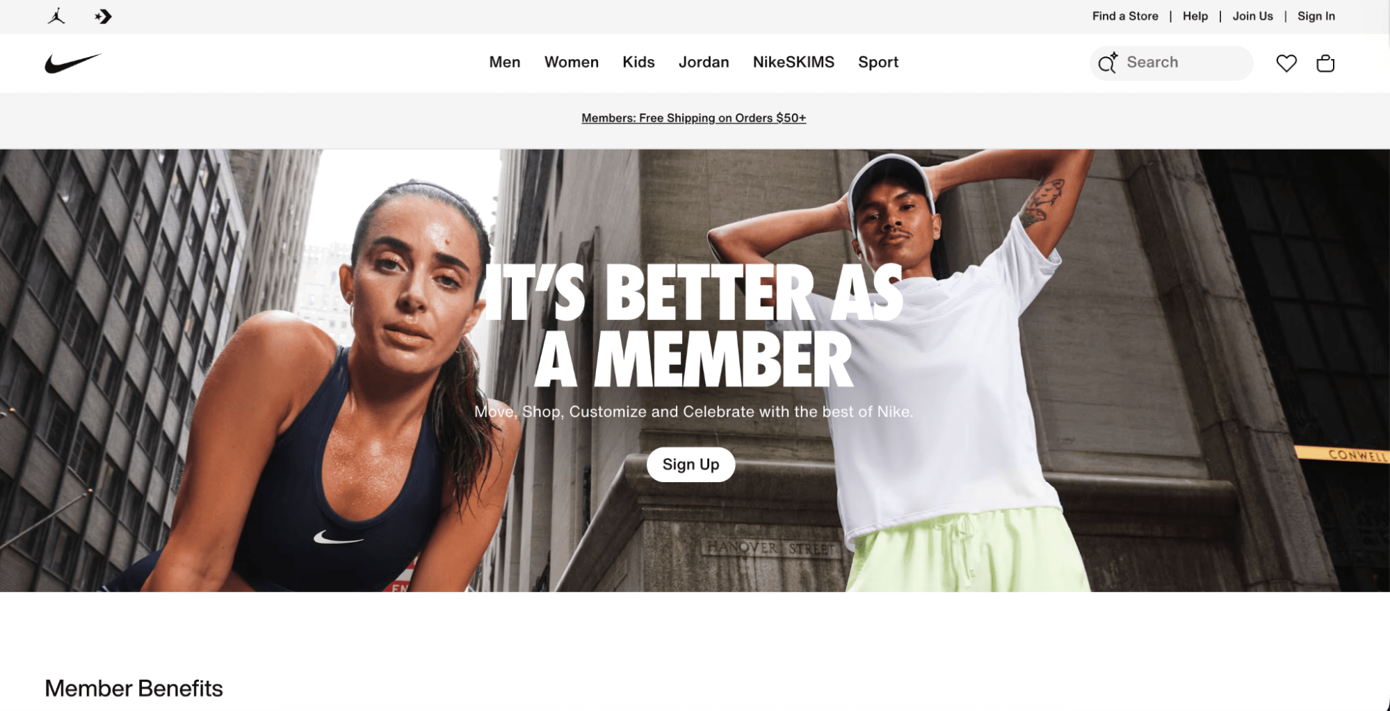 Loyalty programs: Two athletes, a woman in a black tank top and a man in a white shirt and cap, stand outside against tall buildings. Text reads, It’s Better as a Member. Move, Shop, Customize and Celebrate with the best of Nike.