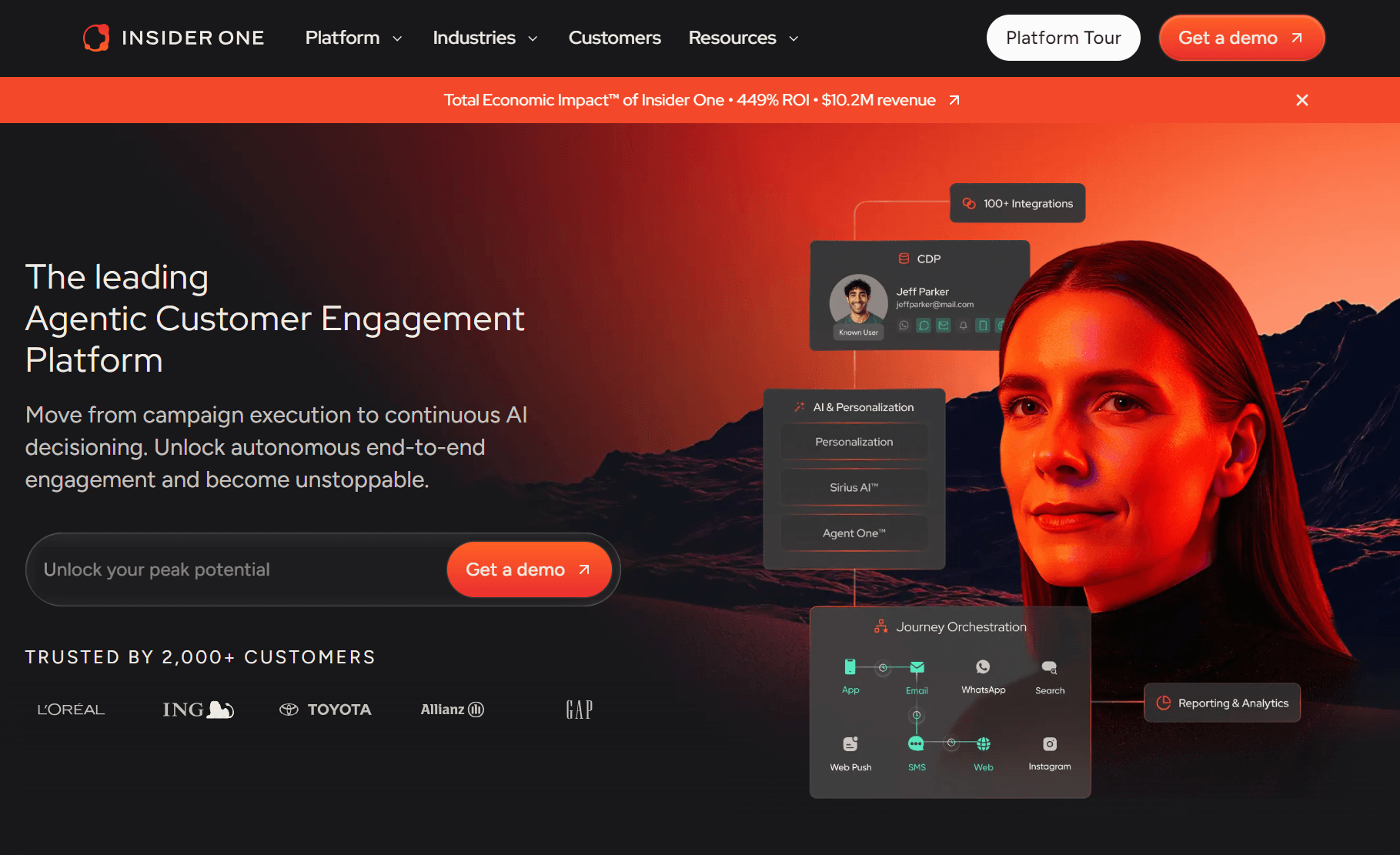 Best ecommerce personalization software: A website homepage for “Insider One,” showing a woman’s face, navigation menus, trust logos (L’Oreal, ING, Toyota, Allianz, etc.), and orange highlights with a dark mountain background. White and orange text describe the platform.