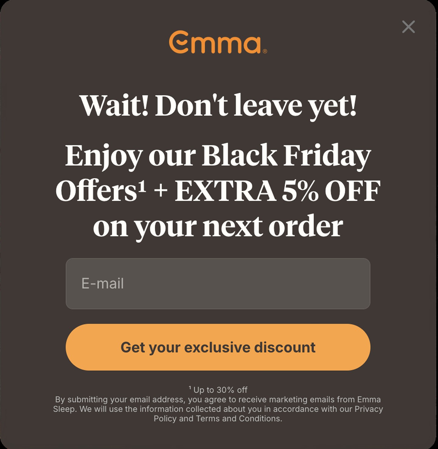Black friday popup: Pop-up ad from Emma offering Black Friday deals and an extra 5% off with email signup. Includes input field for email and orange button to get an exclusive discount. Terms and conditions noted below.