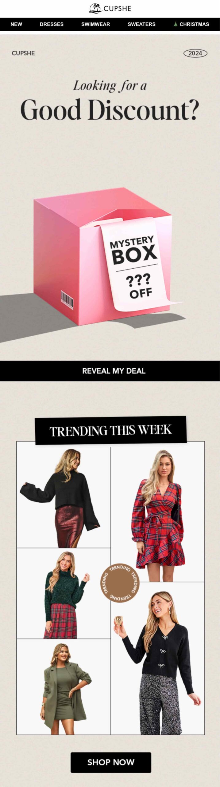 Gamification email marketing: A fashion sale ad with a pink mystery box offering discounts, and five models showcasing trending womens outfits including dresses, skirts, and sweaters. A button says Reveal My Deal, and another says Shop Now..