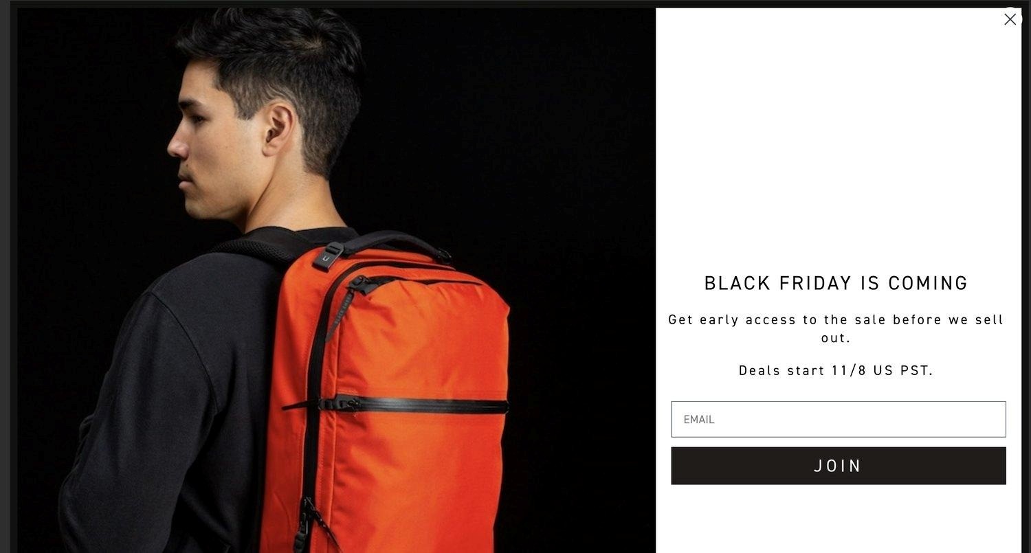 Black friday popup: A person wearing a black jacket and bright orange backpack stands against a black background. Next to them is a text box announcing early Black Friday deals and a section to enter an email and join.