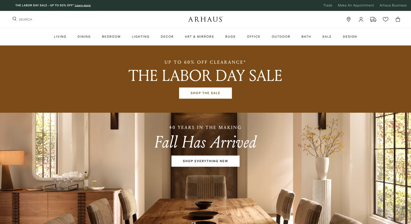Arhaus website homepage promoting Labor Day sale and fall collection, featuring a dining room with wooden table and chairs.