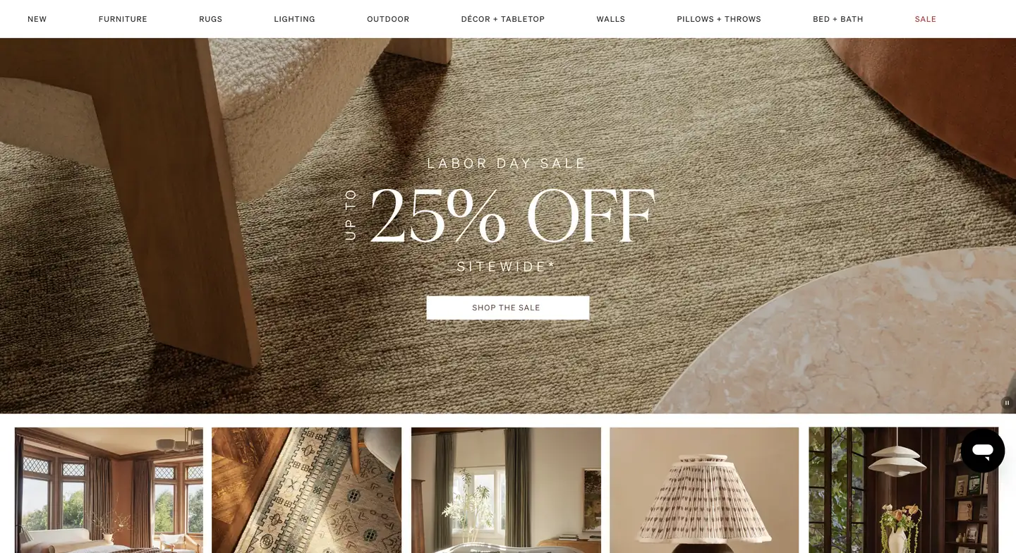 Website homepage showing Labor Day sale with up to 25% off sitewide; neutral-toned home decor items are displayed.