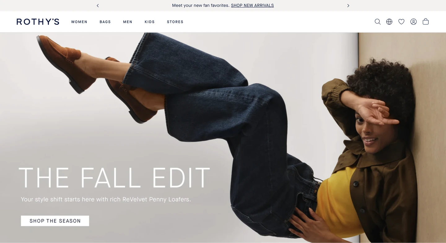 Woman in a yellow shirt and jeans poses playfully against a white background, promoting fall loafers on Rothys website.