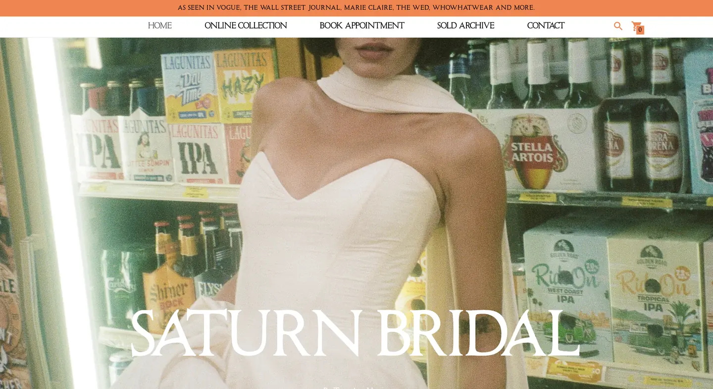 Woman in a white bridal gown stands in front of a refrigerated section with beer and beverages in a store.