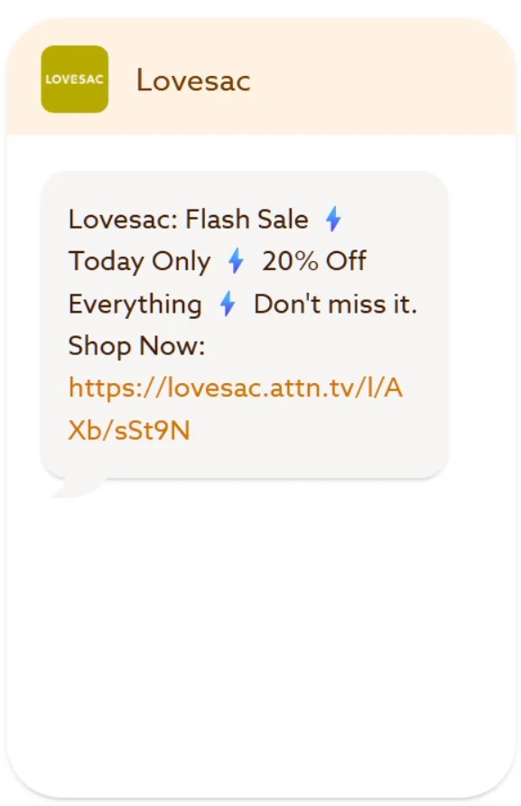 Text message from Lovesac about a flash sale offering 20% off, with a link to shop online.