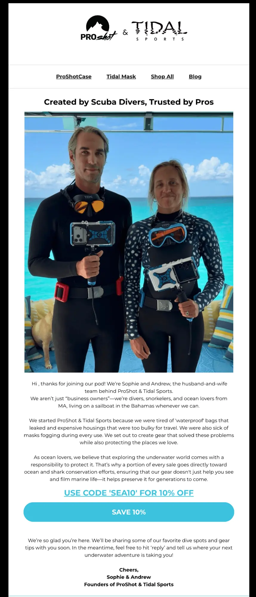 Sophie and Andrew, the founders of ProShot and Tidal Sports, holding underwater camera gear on a sailboat.